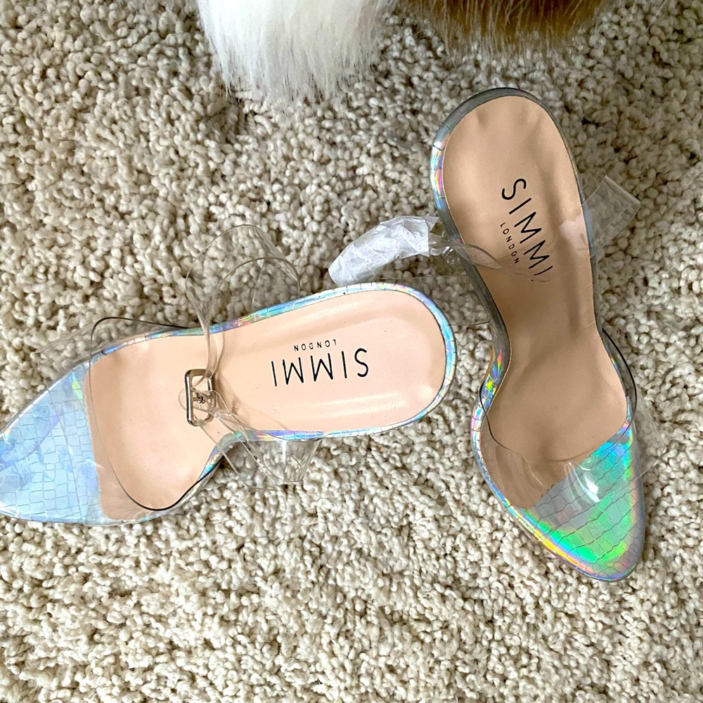New. Clear heels. Never used.